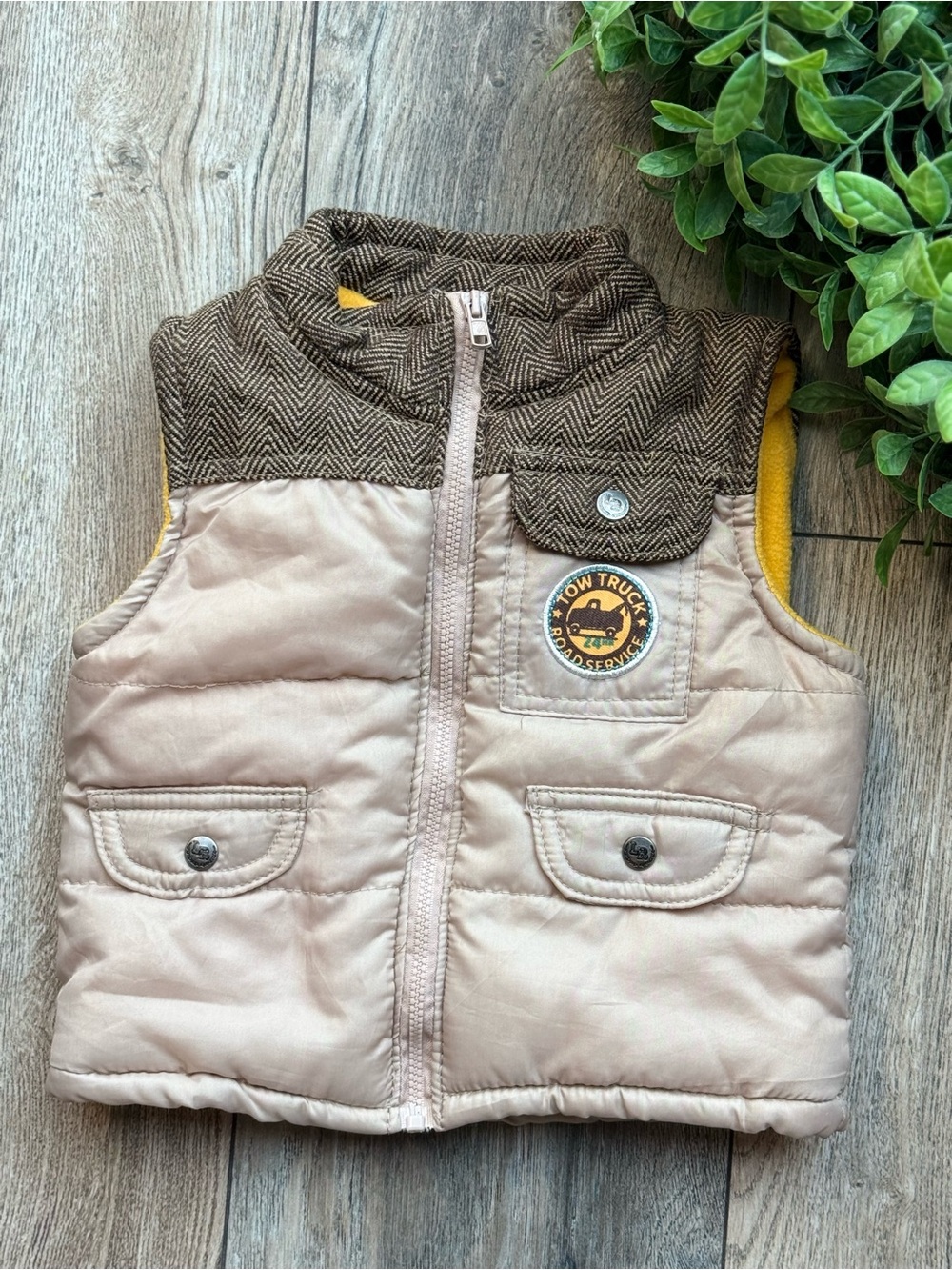 Toddler Beige Puffer Vest with Brown Trim and Tow Truck Patch